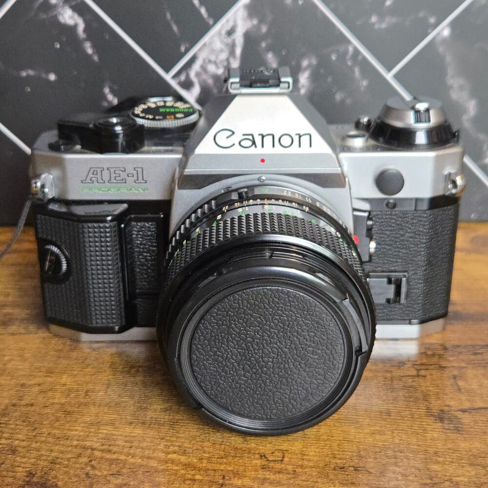 Canon AE-1 Program 35mm Film Camera w/ Canon FD 50mm f/1.4 Lens + Lowepro Bag